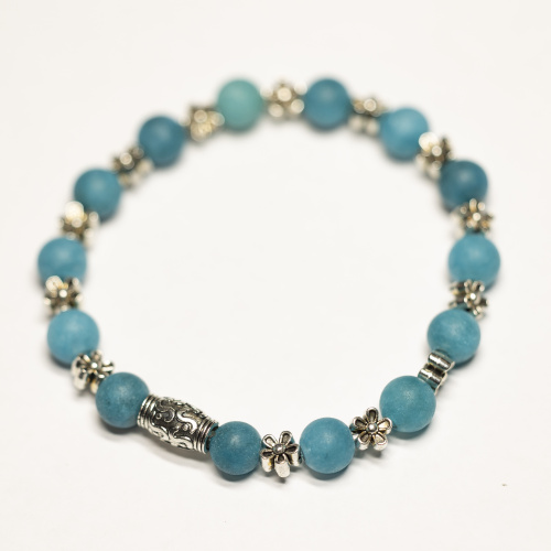 Blauer Kunststein 8 mm matt mit Blumen Elementen