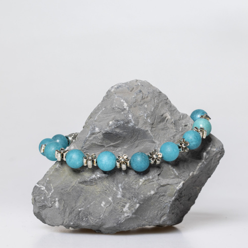 Blauer Kunststein 8 mm matt mit Blumen Elementen