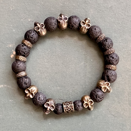 Lavastein mit Totenköpfen Bronze 10 mm