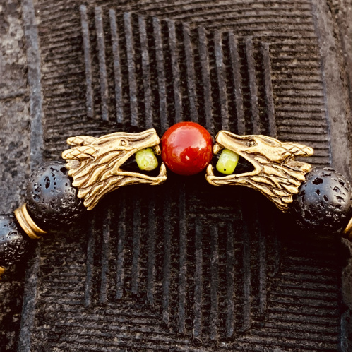 Lavastein Armband mit Drachenköpfen 8 mm matt